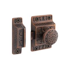 an antique style door handle with intricate designs