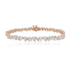 Multi Shape Diamond Tennis Bracelet MATERIALS Available in 18k Yellow Gold, 18k Rose Gold, and 18k White Gold. DETAILS0.18 - .022 pointers each ct.Total Carat: 7.8cts Color: F - GClarity: VS Lengths: 6”, 6.5", 6.75" and 7" (*Other lengths available upon request) *If in stock please allow 3-5 days for delivery. If back-ordered, please allow 4-6 weeks for delivery. Rush options may be available, please contact hello@alevjewelry.com Luxury Rose Gold Baguette Cut Bracelets, Rose Gold Baguette Cut Tennis Bracelet For Formal Occasions, Formal Rose Gold Baguette Cut Tennis Bracelet, Formal Rose Gold Baguette Cut Bracelet, Fine Jewelry Rose Gold Diamond Bracelet With Baguette Cut, Luxury Rose Gold Tennis Bracelet With Baguette Diamonds, Rose Gold Baguette Cut Diamond Bracelet, Bracelet Materials, Necklace Length Guide