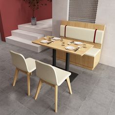 a dining table with two white chairs next to it