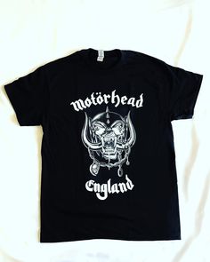 Motörhead T shirt officially licensed merch Motorhead T Shirt, Band Logo T-shirt, Crew Neck, Fan Merchandise, Band Logo T-shirt Fan Merchandise Crew Neck, Punk Black T-shirt For Biker Events, Rocker Short Sleeve T-shirt For Streetwear, Band Merch T-shirt With Band Logo, Band Merch T-shirt With Band Logo, Short Sleeve, Alternative Style Band Logo T-shirt With Crew Neck, Band Merch T-shirt With Logo, Short Sleeve