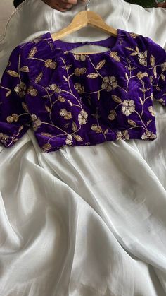 Product Descriptions : Pure silver soft tissue designer saree with embroidery border works comes with purple velvet embroidery worked blouse. View this post on Instagram A post shared by Shobana Nithin (@threadslabel_india) Silver Tissue Saree Blouse Designs, Thread Work For Blouse, Velvet Blouse With Saree, Silver Blouse Designs, Silver Tissue Saree, Embroidery Blouse Saree, Velvet Blouse Design, Blouse Handwork, Worked Blouse