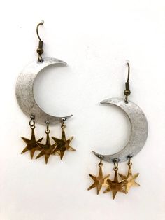 For the celestial goddess in your life--maybe it's you! Mixed metals give a modern edge to these 70s inspired classics. Celestial Metal Jewelry, Vintage Star-shaped Metal Jewelry, Metal Earrings With Moon Charm, Vintage Star-shaped Nickel-free Jewelry, Vintage Nickel-free Star Jewelry, Adjustable Metal Celestial Earrings, Metal Moon-shaped Earrings, Vintage Moon-shaped Metal Earrings, Metal Moon-shaped Earrings For Festivals