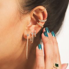 Trendy Gold Single Ear Cuff, Trendy Cubic Zirconia Single Cartilage Earring, Dainty Single Ear Climber For Parties, Trendy Huggie Earrings For Party, Dainty Single Ear Cuff For Party, Cubic Zirconia Ear Cuff For Everyday Wear, Trendy Gold Ear Cuff For Party, Party Cubic Zirconia Ear Cuff, Gold Trendy Party Ear Cuff