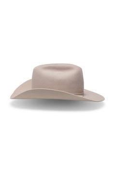 Introducing the light beige Breezy Vision cowboy hat—a timeless piece crafted in our classic silhouette, complete with a refined center crease and a flanged brim. This versatile hat features a tonal self-fabric band, accented by a sleek round silver stud that adds a touch of subtle sophistication. Each hat is handcrafted in our Stockholm studio, ensuring exceptional quality and a perfect fit for all. Western Style Wide Brim Rigid Hat, Western Wide Brim Hat With Rigid Fit, Rigid Wide Brim Western Hat, Western Style Brimmed Top Hat, Western Style Rigid Brimmed Top Hat, Rigid Curved Brim Top Hat For Country Events, Short Brim Rigid Fedora For Western-themed Events, Rigid Short Brim Fedora For Western-themed Events, Rigid Wide Brim Top Hat For Rodeo