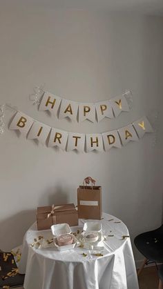 a birthday party with gold confetti and streamers