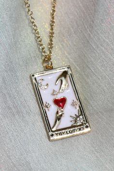 The Lover Tarot Card Necklace Tarot Card Jewelry, The Lover Tarot, Tarot Jewelry, Expensive Christmas, Matching Necklaces For Couples, Tarot Card Necklace, Tarot Card Design, Resort 2017 Fashion, The Lovers Tarot Card