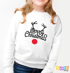 "Merry Christmas Sweatshirt, Christmas Hoodie, Kids Sweatshirt, Merry Christmas Kids Tee, Toddler Holiday Season Sweater, Kids Holiday Gift, Tis the Season, Cute Santa Sweater, Christmas Tree Sweatshirts Welcome to SareKidsStyle! HOW TO ORDER * Please review all the information provided before placing an order. 1. Select the style and size using the drop-down menu. 2. Select color 3. [APPLICABLE ONLY ON CERTAIN LISTINGS] Follow the instructions to fill out the \"Add your personalization\" option, e.g., specifying custom sayings or selecting design colors. 4. Select quantity Need more Items? Add the current item to the cart. And if you like to add more items to your order, please press the back button and repeat steps again. 5. Once all your desired items are in your cart you may complete y Cute White Christmas Sweater, White Christmas Sweater As A Gift, White Christmas Sweater As Gift, White Winter Sweatshirt For Gift, White Winter Sweatshirt Gift, White Sweatshirt For Winter Gift, White Winter Sweatshirt As A Gift, White Embroidered Sweatshirt As Winter Gift, Cute White Christmas Sweatshirt