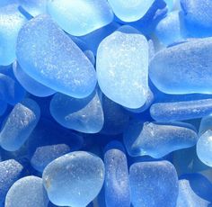 closeup of blue and white glass pebbles