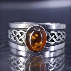 Size 9, vintage sterling silver 925 Irish Celtic knotted handmade band ring with amber, stamped 925 sterling Irish Celtic, Multi Stone Ring, Multi Stone, Sterling Silber, Band Ring, Vintage Sterling Silver, Stone Rings, Silver 925, Halloween Shopping