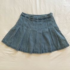 Denim Pleated High Waist Mini Tennis Skirt. Never Worn. Denim Blue Pleated Denim Skirt, Casual Medium Wash Pleated Denim Skirt, Casual Denim Blue Pleated Mini Skirt, Casual Pleated Denim Blue Skirt, Blue Pleated Mini Denim Skirt, Casual Pleated Denim Mini Skirt, Pleated Medium Wash Cotton Denim Skirt, Pleated Blue Denim Cotton Skirt, Blue Pleated Cotton Denim Skirt