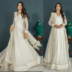 White On Gold Is Always A Win Win!! The Fabric Looks Just As Luxe As It Feels. This Classically Elegant Angrakha In A Luscious Off White Shade Is Layered With A Blissful Composition. It Features A Synthetic Embroidered Chiffon Angrakha With Exquisite Embroidery In Mesmerizing White-Gold Threads At The Front, Sleeves & Dupatta Reflecting A Beautiful Blend Of Grace And Luxury With Dori And Embroidered Tassels At The Neck. Handmade Tassels On The Dupatta Is Giving Gorgeous Aesthetic, And Alluring Look. Wear This Piece On Nikkah, Engagement, Heavy Formal Or Any Festive Occasion! Chest 21 “ Length 60” Embroidered Chiffon, Gold Threads, Tassels, Chiffon, Composition, White Gold, Off White, Festival, Embroidery