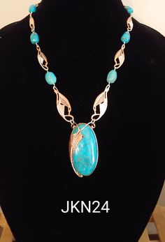 "Unusual Kingman Turquoise pendant necklace from Jay King features a huge 1 1/2\" x 2 1/2\" pendant set in two-tone .925 sterling silver (the back is copper colored) suspended from a chain made of intricate metal work and turquoise stations. It hangs at 22\", has a 3\" extender, and is still in its original packaging." Turquoise Pendant Necklace, Kingman Turquoise, Metal Work, Turquoise Pendant, Pendant Set, Windsor, Pendant Necklaces, Metal Working, Jay