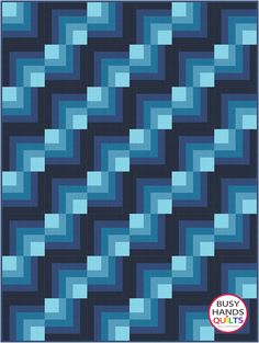 a blue and black quilt with squares on it