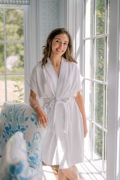 Our Terry Robe is a breezy loungewear essential that combines comfort and style. Crafted from plush cotton terry and trimmed with charming seersucker, this robe is designed to hit above the knee, offering a flattering and versatile silhouette. The cap-sleeve kimono style enhances its lightweight feel, making it ideal for summer or year-round use. Material: Terry CottonSize & Fit: Runs generous, If in between sizes, size down.Care guide: Machine wash cold with like colors. Hang to dry. The model Cozy Cotton Robe For Loungewear, Casual Robe For Relaxation, Cozy Relaxed-fit Robe For Daywear, Cotton Robe For Spring Loungewear, Spring Loungewear Robe Relaxed Fit, Casual Cotton Lounging Robe, Summer Loungewear Robe With Tie Waist, Summer Relaxed Fit Robe For Loungewear, Spring Relaxation Robe With Tie Waist