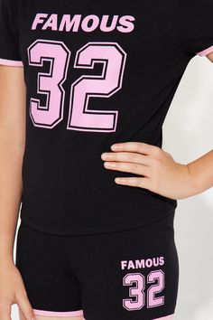 Available In Black/combo. Short Set Short Sleeve With Graphic Contrast Trim Stretch Model Wears Size L XS: (4/5), S: (6/6X), M: (7/8), L: (10/12), XL: (14/16) Mommy & Me Takedown of "Almost Famous Short Set" Disclaimer: Due To The Printing Process A Difference In Saturation May Occur. Each Garment Is Unique. Self/Contrast: 95% Cotton 5% Spandex Imported | Mini Almost Famous Short Set in Black size XS by Fashion Nova Stretch Black Tops For Playwear, Black Stretch Tops For Playwear, Black Spring Playwear Tops, Black Graphic Print Playwear Sets, Black Graphic Print Sets For Playwear, Black Letter Print Playwear Sets, Black Letter Print Sets For Playwear, Trendy Black Crew Neck Sets, Almost Famous