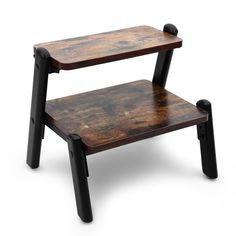 a wooden table with two black legs and a small shelf on the top that is made out of wood