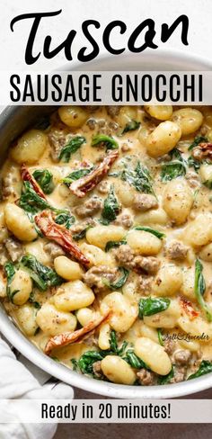 a white bowl filled with sausage gnocchini and spinach