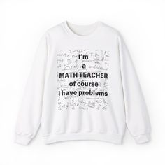 I'm A Math Teacher, Of Course I Have Problems- Unisex Sweatshirt, School Math Teacher, Math Problems, Teacher Appreciation Gift At MayaMenaPrints we value the customer experience. For any questions or special requests, feel free to reach out. Enjoy browsing our shop, and we hope you find something you love! FEATURES PRODUCT INFO: Made from medium-heavy fabric blend of 50% cotton and 50% polyester. Unisex long- sleeve sweatshirt Care: Machine wash cold, delicate cycle inside out with like colors. Tumble dry low or hang to dry. Do not iron directly on the design. SIZING Unisex sizing. We recommend ordering your true size for a more fitted feel and sizing up a size if you want a more relaxed look. For an oversized feel, consider sizing up by 1-2 sizes based on the size chart. Please review th White Cotton Sweatshirt With Letter Print, White Cotton School Sweater, White Long Sleeve T-shirt With Funny Text, Casual School Sweater With Letter Print, White Long Sleeve Sweatshirt With Funny Text, White Long Sleeve Tops With Funny Text, White Text Print Sweater For College, White Crew Neck Sweater For School, Winter School T-shirt With Letter Print