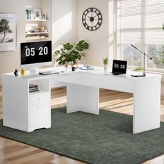 an office desk with a clock on the wall above it and a rug in front of it