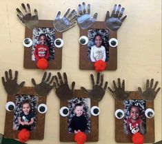 handprints are placed on the wall with pictures of children's hands and eyes