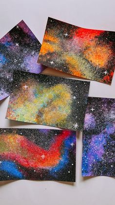 four pictures with different colored stars on them and one has been made to look like the night sky