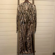 Originally Bout From Boutique, Still Has Tags Never Worn. Black Sheer Fabric With Rose Gold Beading In Lace Design. Chic Sequined Cardigan, Chic Long Sleeve Sequined Cardigan, Chic Embellished Fall Cardigan, Chic Embellished Cardigan For Fall, Chic Sequined Cardigan For Fall, Chic Embellished Cardigan For Party, Chic Embellished Party Cardigan, Elegant Winter Cardigan With Sequins, Embellished Long Sleeve Cardigan For Fall