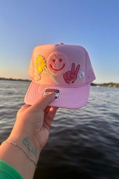 A Wild Bohemian exclusive! One of a kind, trucker hat with patches to match your own unique style! Adjustable snap back closure. Lightweight & breathable mesh back. Made with a durable foam material Pink Adjustable Trucker Hat For Outdoor, Adjustable Pink Trucker Hat For Outdoor, Casual Pink Mesh Baseball Cap, Pink Mesh Hat With Curved Brim, Pink Summer Trucker Hat For Outdoor, Pink Mesh Baseball Cap For Summer, Pink Mesh Baseball Cap, Pink Trucker Hat For Summer Outdoor, Summer Outdoor Pink Trucker Hat