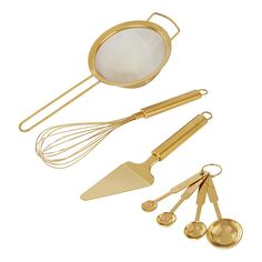 golden kitchen utensils and spatulas on a white background