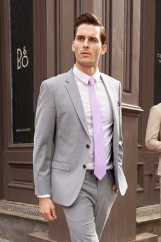 The Lite Grey Jacket is perfect for any wedding, special occasion or business setting. We tirelessly evaluate thousands of fabrics before choosing the best in the industry. Our attention to detail is evident in luxury features like pick-stitching on the lapel and kissing buttons. We use the finest, most breathable, natural, 100% super fine 150’s Merino wool making the suit soft to the touch while remaining breathable and extremely comfortable for everyday use. The gorgeous lining brings together Classic Fitted Blazer For Wedding, Wedding Outerwear With Single Button And Notch Lapel, Formal Slim Fit Blazer For Spring, Slim Fit Formal Blazer For Spring, Classic Tailored Blazer For Wedding, Classic Tailored Wedding Blazer, Professional Single-breasted Tuxedo, Tailored Single Button Wedding Blazer, Tailored Single Button Blazer For Wedding