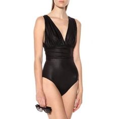 Max Mara Ortisei Metallic One Piece Swimsuit 12 Usa New With Tags Max Mara Takes A Vacation To Warmer Tropics With This Plunge Swimsuit. Exuding Classic Femininity, It Details A V-Neck And Is Supported By Wide Shoulder Straps. Showcased In A Metallic Effect, The Sleek And Shining Exterior Provides A Glamourous Yet Futuristic Feel. Color: Black V-Neck Metallic Sheen Fully Lined Hand Wash Materials: 89% Polyamide, 11% Elastane~Lining: 82% Polyamide, 18% Elastane Elegant Black Swimming Bodysuit, Elegant Black Bodysuit For Pool, Elegant Black One-piece Bodysuit, Elegant V-neck Party Swimwear, Elegant One-piece Bodysuit For Pool, Elegant Evening One-piece Bodysuit, Elegant One-piece Bodysuit For Evening, Elegant Black Bodysuit With Lined Body, Chic Formal Swimwear For Summer