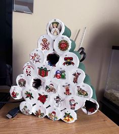 a christmas tree made out of plates on a table