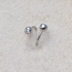 ⋙ Surgical Steel belly ring.⋙ This listing is for one belly ring.⋙ Available gauges: 16g.⋙ Available lengths: 5/16 (8mm), 3/8 (10mm), 7/16 (11mm)⋙ Measurements:⋙ The balls are 5mm in diameter⋙ ⋙ I will put your order into a beautiful jewelry box (it will be ready for gift giving). Belly Ring Hoop, Belly Button Jewelry, Navel Piercing, Button Rings, Belly Piercing, Belly Ring, Button Jewelry, Belly Rings, Belly Button