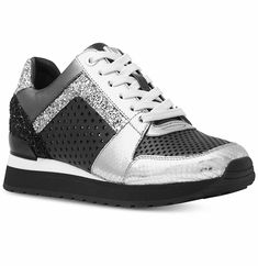 New Michael Kors BILLIE TRAINER Lace Up Sneakers Women's Shoes  Color: Black/Silver Billie trainers are a sport-luxe essential. Wear them with everything from T-shirt dresses to denim for a casually cool look. • 90% Polyester/5% Metallic Yarn/5% Elastic • Sole: Rubber • Almond Toe • Lace-Up Fastening • Imported All items are shipped within 24 Hours of processing your cleared payment   Authenticity 100% Guaranteed! Please bid with confidence, all our items are from Michael Kors Stores, Coach Stor Casual Metallic Sneakers With Perforated Toe Box, Silver Sports Sneakers With Laces, Metallic Low-top Sneakers For Spring, Silver Sports Sneakers, Spring Metallic Low-top Sneakers, Spring Silver Synthetic Sneakers, Silver Synthetic Sneakers For Light Sports, Casual Metallic Sneakers, Silver Lace-up Synthetic Sneakers