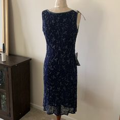 Beautiful Navy Beaded Dress. Nwt Absolutely Stunning!! Formal Sleeveless Beaded Dress, Formal Beaded Sleeveless Dress, Sleeveless Beaded Formal Dress, Elegant Beaded Sleeveless Sequin Dress, Formal Sleeveless Beaded Sequin Dress, Blue Beaded Dress For Night Out, Blue Embellished Evening Midi Dress, Formal Sleeveless Sequin Dress With Beads, Blue Embellished Midi Dress For Evening