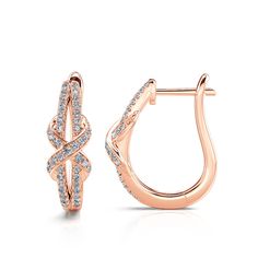 Embrace your individuality and make a statement with these hoop Earrings. Crafted in rose-gold tone sterling silver, each earring is set with sparking round-cut stones and decorated with a sparkling white stones X motif. These simple hoop earrings embody a simple and classy aesthetic, complementing your minimalist and unique style. Whether worn alone or layered with a charm necklace, they offer a chic look that is sure to turn heads.Carat Weight: 0.61 ctStone Size: 0.8,0.9,1 mmStone Type: Jeulia Vintage Gold Brooch, Minimalist Jewellery, Modern Gold Jewelry, Art Jewelry Design, Simple Hoop Earrings, White Stones, Classy Aesthetic, Gold Earrings Designs, Latest Jewellery