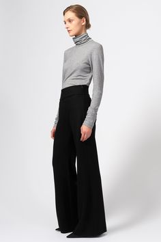 Made in our Japanese felted jersey, these high-waisted wide leg pants were designed to add elegance to your cold weather wardrobe. With a 2.75" folded waistband for a flattering fit, this style features and invisible zip closure and our signature lipstick front pocket. 2.75" folded waistband side invisible zip closure, signature lipstick front pocket, and invisible hem finish. - 100% Japanese Wool - Made in NYC - Dry clean only - Our model is 5'9" wearing size S - Waist 30", Rise Including Waist Jersey Wide Leg Pants Outfit, Invisible Hem, Capsule Wardrobe Pieces, High Waisted Wide Leg Pants, Business Casual Outfits For Women, Dressed To The Nines, Stylish Work Outfits, Office Attire, Invisible Zip