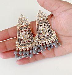 Grey dangal indian earrings. Elegant Danglers With Dangling Beads For Diwali, Festive Beaded Drop Earrings For Celebration, Festive Drop Beaded Earrings For Celebrations, Festive Chandelier Earrings With Dangling Beads For Party, Elegant Diwali Danglers With Dangling Beads, Gold Beaded Earrings For Festivals And Parties, Gold Beaded Earrings For Party And Festivals, Bohemian Drop Earrings For Festive Bridal Wear, Festival Chandbali Beaded Party Earrings