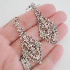 "Vintage Jewelry - Vintage Earrings - Filigree Earrings - Brass Earrings - Art Deco Earrings - Chloes Vintage Handmade Jewelry These are such exquisite earrings! Gorgeous long vintage brass intricate lacy Art Deco earrings. Just beautiful Chloe says, \"Wear them and feel fabulous!\" They measure a stunning 2 1/2\" long\" from the top of the ear wire Thanks for visiting Chloe's" Victorian Drop Earrings For Pierced Ears, Filigree Metal Earrings For Anniversary, Metal Teardrop Jewelry With Intricate Design, Anniversary Filigree Earrings, Ornate Drop Earrings With Intricate Design, Ornate Metal Plug Earrings, Victorian Filigree Chandelier Earrings As Gift, Ornate Chandelier Earrings With Ear Wire, Ornate Nickel-free Teardrop Dangle Earrings