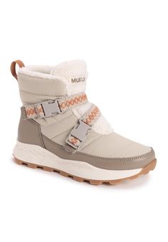 Nothing says warmth, style and comfort like MUK LUKS Women's Wren Boots in the winter. You'll get a fashionable upgrade from the quilted nylon hi-top, faux-fur lining, metal taping and stitching details throughout. Pull on these boots and envelop your feet in warmth thanks to the signature Muk Luxe lining and Memory foam.100% Polyurethane Upper100% Polyester Lining100% Thermoplastic Rubber (TPR) Outsole100% Polyester Footbed0.79 Heel height8.54 Boot leg circumferenceBoot available in sizes 6 - 11 | Women's Wren Boot by MUK LUKS in Driftwood (Size 6 1/2 M) Steve Madden Sneakers, Shearling Boots, Flip Flop Slippers, Baby Boy Shoes, Pull On Boots, Hi Top, Sweaters And Leggings, Comfortable Sandals