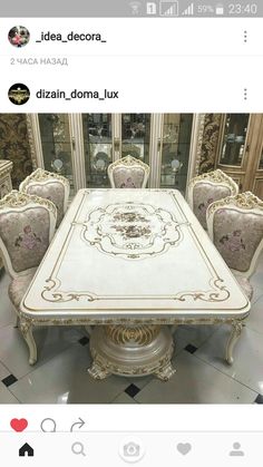 an image of a dining table and chairs in the middle of a room with tile flooring