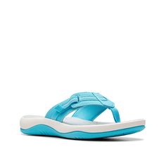 Clarks-Cloudsteppers Sunmaze Tide Sandal Elevate your beachwear with Cloudsteppers Sunmaze Tide sandals from Clarks. The classic flip flop silhouette features a casual style that's perfectly for laidback days, as well as a supportive Cusionsoft footbed to provide ultimate comfort. Flat Sport Sandals With Ortholite Insole For Beach, Beach Slip-on Sandals With Ortholite Insole, Vacation Flip Flops With Ortholite Insole, Slip-on Sandals With Arch Support For Beach Season, Beach Season Toe Post Sandals With Arch Support, Ortholite Insole Flat Flip Flops For Beach, Toe Post Sandals With Arch Support For Beach Season, Ortholite Insole Toe Post Flip Flops For Vacation, Blue Sport Sandals With Ortholite Insole For Beach