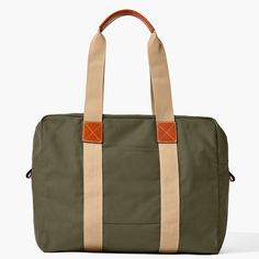 Travel in Style  With this travel-ready look, crafted from 100% Egyptian cotton canvas woven in Italy, you'll be able to pack for days at a time, so get ready to see the world in style. Khaki Canvas Travel Bag, Green Weekender Bag With Leather Handles For Travel, Casual Weekender Bag With Waxed Finish For Travel, Casual Waxed Finish Weekender Bag For Travel, Casual Khaki Canvas Travel Bag, Casual Waxed Canvas Travel Bag With Leather Trim, Casual Weekender Bag With Leather Trim For Weekend Trips, Casual Weekender Bag With Leather Trim For Travel, Casual Travel Bag With Leather Trim For Overnight Trips