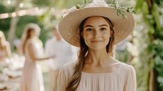 a woman wearing a straw hat with flowers on her head and other people in the background