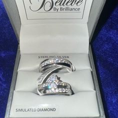 a diamond ring in a box on display