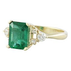 Stamped: 14K Total Ring Weight: 2.6 Grams Emerald Weight 2.00 Carat (8.60x6.50 Millimeters)Diamond Weight: 0.23 carat (F-G Color, VS2-SI1 Clarity )Face Measures: 8.60x15.00 Millimeter SKU: [600961] Classic Emerald Diamond Ring With Accent Stones, Classic Yellow Gold Cluster Ring With Accent Stones, Classic Yellow Gold Emerald Ring With Accent Stones, Classic Cluster Emerald Ring, Classic Emerald Cluster Ring With Diamond Accents, Classic Cluster Emerald Diamond Ring, Classic Emerald Ring With Prong Setting In Cluster Shape, Classic Cluster Rings With Accent Stones, Classic Cluster Emerald Ring With Prong Setting