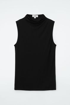 Sophisticated basics are an easy way to add interest to an outfit. This jersey tank top is crafted from TENCEL™ Lyocell with a slinky hand-feel that enhances the slim silhouette. It's designed in a lasting black hue and features a high neckline that drapes ever so slightly. TENCEL™ is a trademark of Lenzing AG. TENCEL™ Lyocell is made from renewable wood sources, using a process that recycles 99% of all chemicals and water Shell: 100% TENCEL™ Lyocell. Excluding trims / Machine wash Back length of size S is 66.5cm / Model wears a size S Versatile High Neck Tank Top, Sleeveless Second-skin Top For Summer, Summer Sleeveless Second-skin Top, Second-skin Sleeveless Top For Summer, Spring Sleeveless Second-skin Tops, Chic Sleeveless Second-skin Top, Sleek Seamless Sleeveless Tank Top, Soft Stretch Sleeveless Summer Tops, Sleeveless Second-skin Tops For Layering