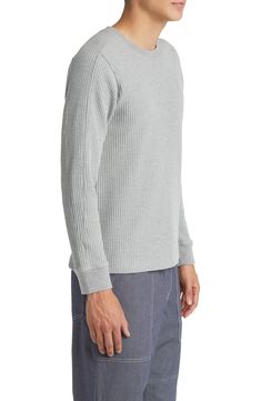 Add an extra layer of cozy warmth to your look with this T-shirt made from a thermal knit that helps trap heat with its waffle texture. 28" length Crewneck Long sleeves with ribbed cuffs 65% polyester, 35% cotton Machine wash, tumble dry Imported Winter Waffle Knit Sweatshirt For Layering, Long Sleeve Waffle Knit Sweatshirt For Layering, Casual Waffle Knit Sweatshirt For Layering, Winter Waffle Knit Sweatshirt For Loungewear, Relaxed Fit Waffle Knit Sweater For Layering, Everyday Cotton Waffle Knit Sweater, Ribbed Sweater For Layering, Cozy Cotton Waffle Knit Top, Cozy Fit Textured Knit Cotton Tops