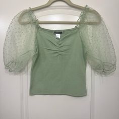 Super Cute Crop Top In Mint Green Or Pistachio. The Sleeves Are Puffy And Sheer. Super Cute For Summer/Spring! Green Puff Sleeve Summer Top, Green Puff Sleeve Top With Short Sleeves For Spring, Green Puff Sleeve Tops For Spring, Trendy Green Puff Sleeve Top For Spring, Green Puff Sleeve Top For Party, Cute Fitted Green Blouse, Green Fitted Puff Sleeve Top For Spring, Cute Green Spring Blouse, Fitted Green Puff Sleeve Top For Spring