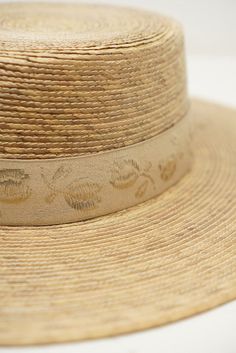 Fine palm leaf straw boater hat Luxury Toquilla Straw Boater Hat With Short Brim, Luxury Woven Boater Hat In Toquilla Straw, Luxury Palm Leaf Panama Hat For Spring, Luxury Cream Toquilla Straw Sun Hat, Luxury Summer Hats Made Of Palm Leaf, Luxury Toquilla Straw Boater Hat With Flat Crown, Luxury Brimmed Panama Hat In Palm Leaf, Luxury Palm Leaf Straw Hat For Summer, Luxury Brimmed Palm Leaf Hat