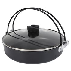 a black pot with a lid and handle on a white background for use in cooking